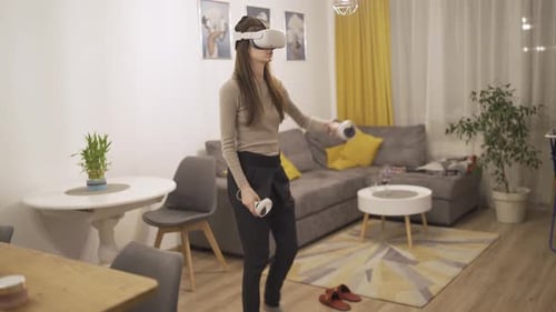 Woman Experiencing Virtual Reality in Home Living Room