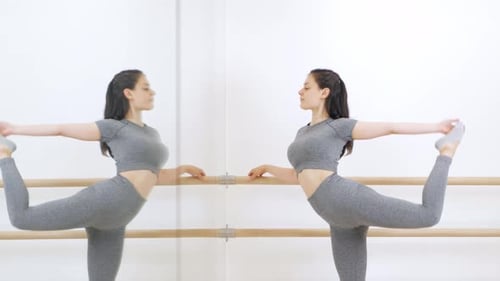 Female Gymnast Dances in Hall Does Stretching Beautiful Poses Ballet