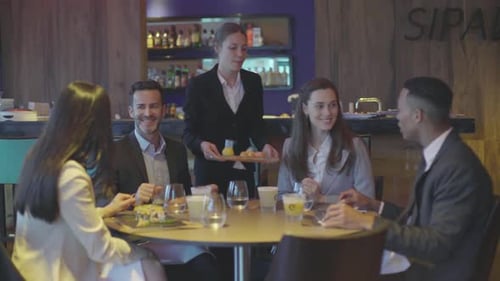 Friends dining together in restaurant
