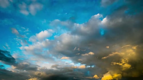 Dramatic Clouds Moving Across Expansive Sky