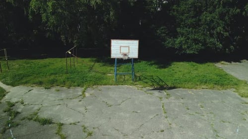Empty Basketball Court in Urban Park from Above