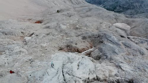 Drone Flight Over Hikers In Mountain Landscape