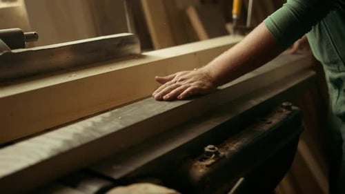 Hand Guides Wood on Cutting Table