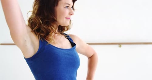 Woman Dancing Elegantly in a Bright Studio