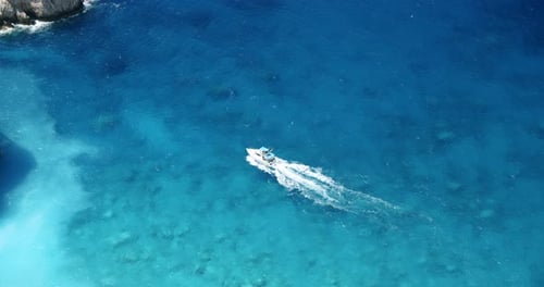 Tourist Pleasure Boats on Island Hopping Trip in Blue Sea Water