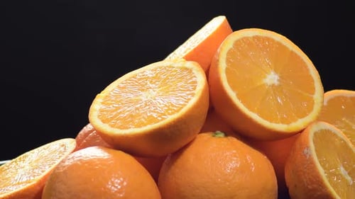 Oranges Fruit Cut in Half Gyrating