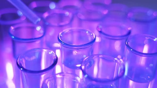 Pipette Adding Fluid to Glass Test Tube