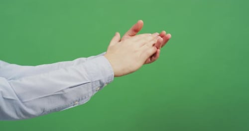 Close up of hands clapping