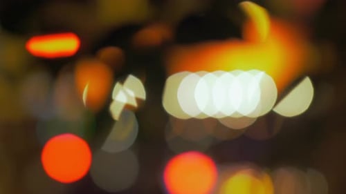 Abstract background with defocused city lights at night