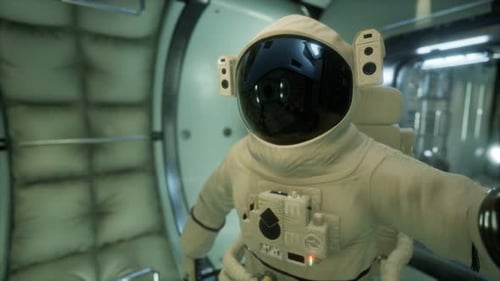 Astronaut Inside the Orbital Space Station