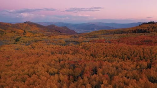 Wide aerial view of colorful Autumn landscape in the Utah mountains a sunset