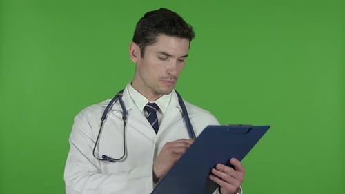 Doctor Going Through Checklist Documents, Chroma Key