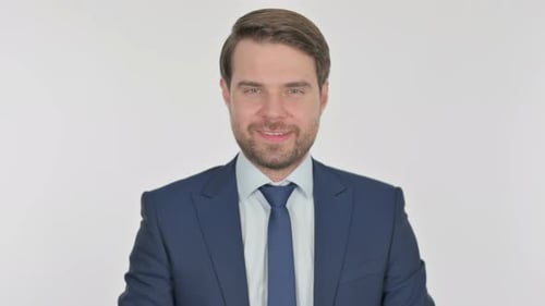 Man in Suit Pointing Directly at the Viewer