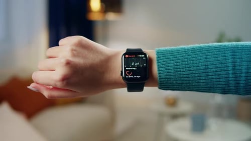 Smartwatch Displays Heart Rate on Person's Wrist