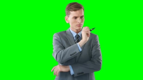 Businessman writing on a digital interface board