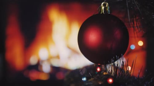Christmas Ornament by Warm Fireplace in Holiday Home