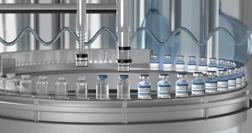 SARSCOV2 COVID19 Mass Production of Coronavirus Vaccine a Machine Pours the Vaccine Seals Bottle
