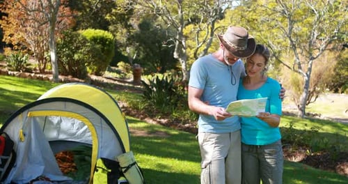 Couple Exploring Nature Together While Camping