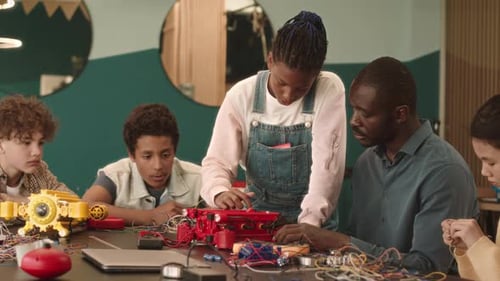 Teacher and Kids at Robotics Class