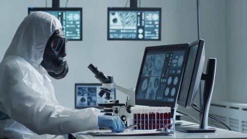 Scientist Analyzing Samples Under Microscope in Lab