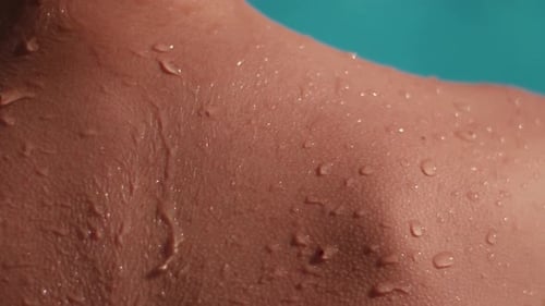 Water Droplets on Shoulder after Swim