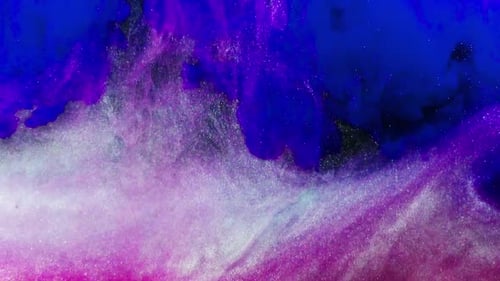 Colorful Ink Swirls and Mixes Abstractly