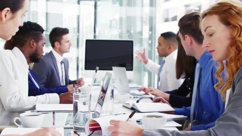 Diverse Team Collaborating at a Meeting in Office