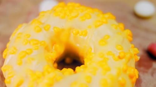 Pink Donuts Decorated with Yellow Icing