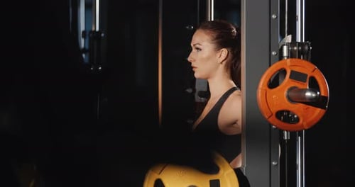 Athletic Woman Training With Barbell Sport Simulator In Gym Workout Sport