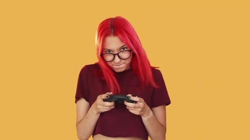 Intense Young Gamer Focused on the Game