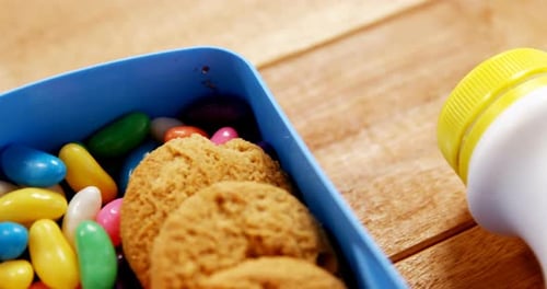 Close-up of cookie with sandwich and confectionery