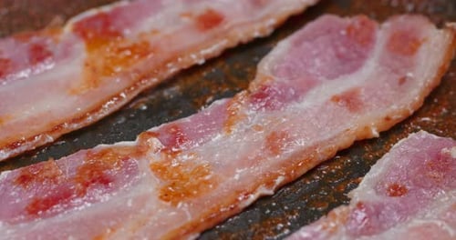 Bacon Sizzling in a Frying Pan