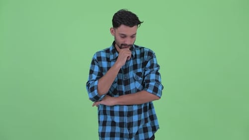 Young Man Thoughtful, Standing in Studio