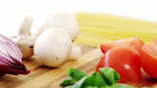 Raw spaghetti with ingredients