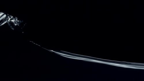 Water Surface Ripple on Black Background