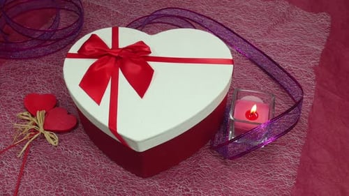 Heart Shaped Box with Candle and Ribbon