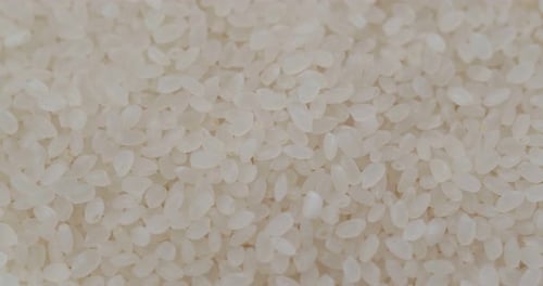Stack of white rice in rotation