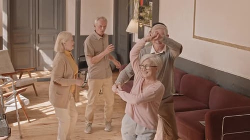 Group of Seniors Dancing Happily Together