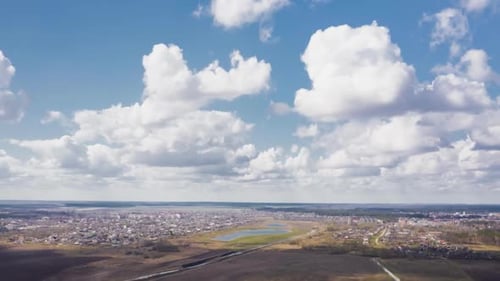 Aerial View of Village, Fields and Forest