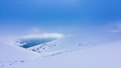 Winter Mountains Aerial View with Dramatic Sky