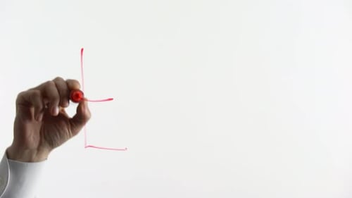 Hand Writes the Word Error on White Surface