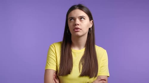 Woman Rolls Eyes with Annoyance and Disgust