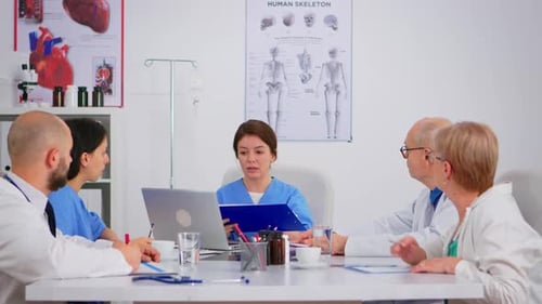 Medical Team Meeting in Hospital Conference Room