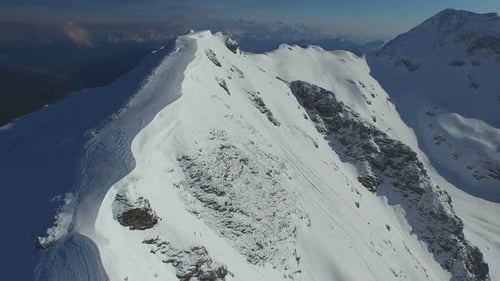 Aerial Closeup Snow Covered Mountain