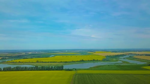 Aerial View of Farmland with Fields and Rivers