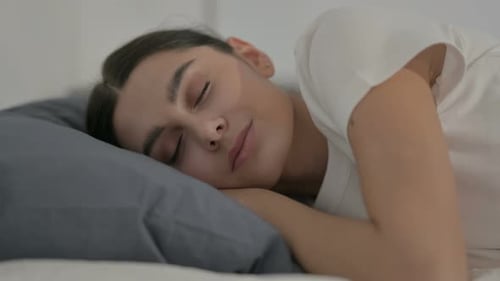 Woman Sleeping Peacefully in Bed Close Up