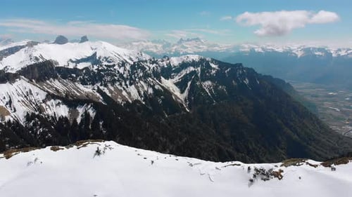 Aerial Drone View on Snowy Peaks of Swiss Alps. Switzerland. Rochers-de-Naye Mountain Peak.