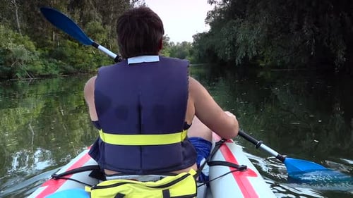 Man on Kayak Swim on Big River.