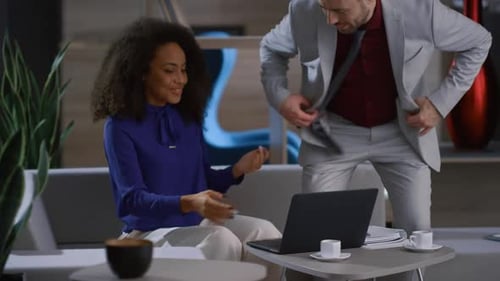 Multiethnic Executive Couple Meeting Connecting Video Call in Cafe Coworking