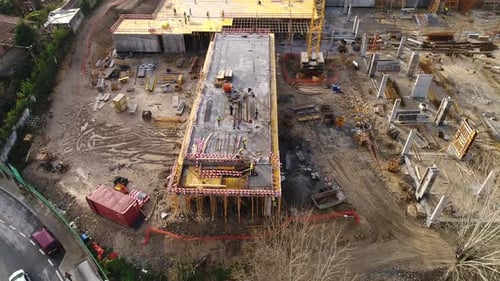 Workers On The Building Construction